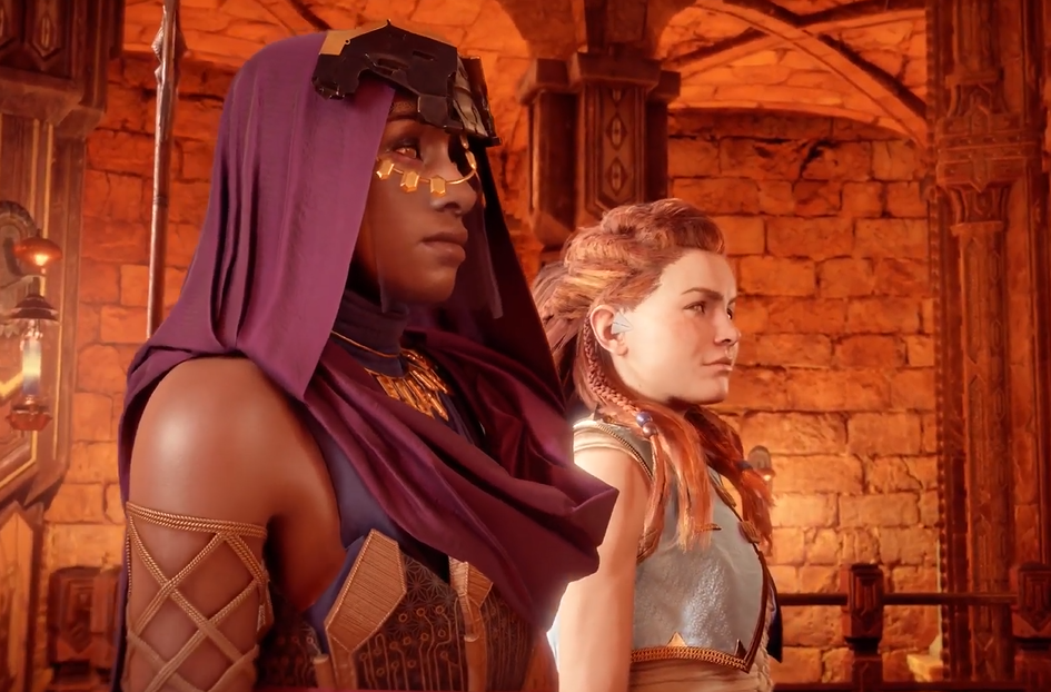 a screenshot of the game  Horizon Zero Dawn that shows Aloy and another character wearing a purple headscarf and gold face chains. Both are looking into the distance