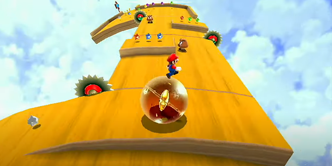 A screenshot of the game depicting mario riding a ball on a platform in the sky